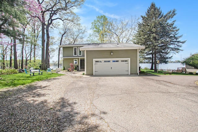 47463 Lakeview Dr, Lawrence, MI 49064 - view of front of home with asphalt driveway and a garage