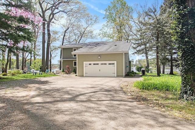 47463 Lakeview Dr, Lawrence, MI 49064 - view of side of property featuring driveway and a garage