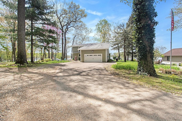 47463 Lakeview Dr, Lawrence, MI 49064 - view of side of home featuring asphalt driveway and a garage