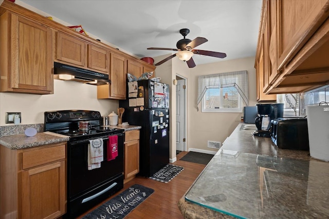 kitchen with baseboards, ceiling fan, under cabinet range hood, dark wood-style floors, and black appliances