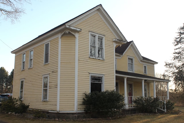 view of home's exterior with covered porch