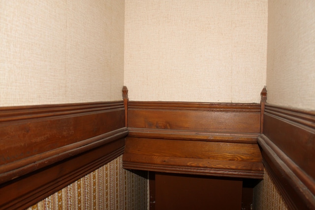 interior space featuring a wainscoted wall