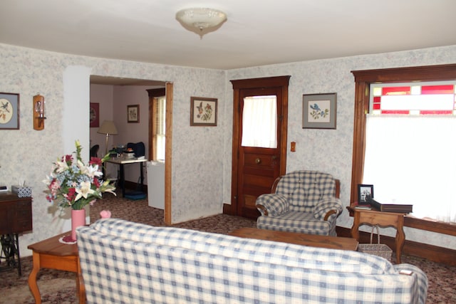 bedroom with wallpapered walls