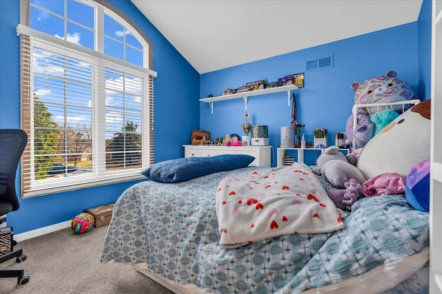 bedroom featuring visible vents, lofted ceiling, carpet, and baseboards