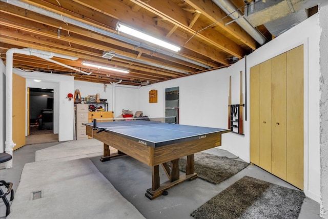 game room featuring concrete flooring