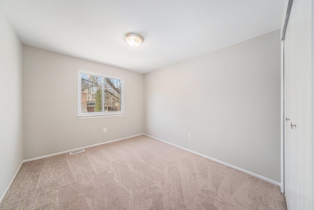 1019 Colony Dr, Saline, MI 48176 - carpeted empty room featuring baseboards and visible vents
