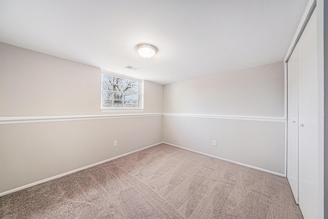 1019 Colony Dr, Saline, MI 48176 - unfurnished room featuring visible vents, baseboards, and carpet