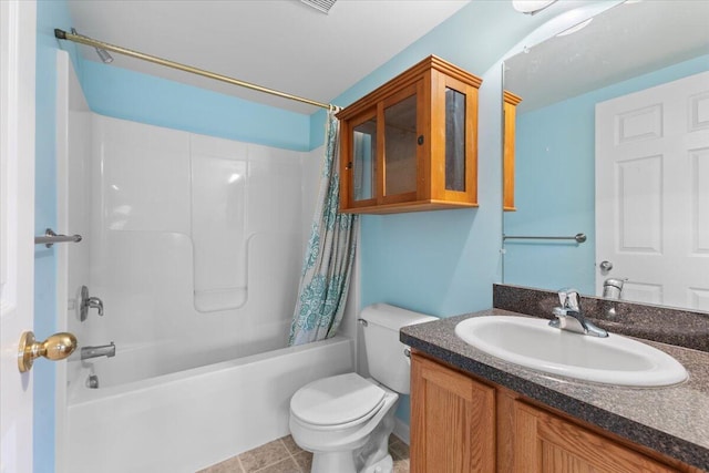 bathroom featuring tile patterned floors, vanity, toilet, and shower / tub combo with curtain