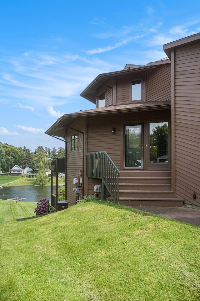 490 Skyline Dr, Horton, MI 49246 - back of property with a water view and a yard