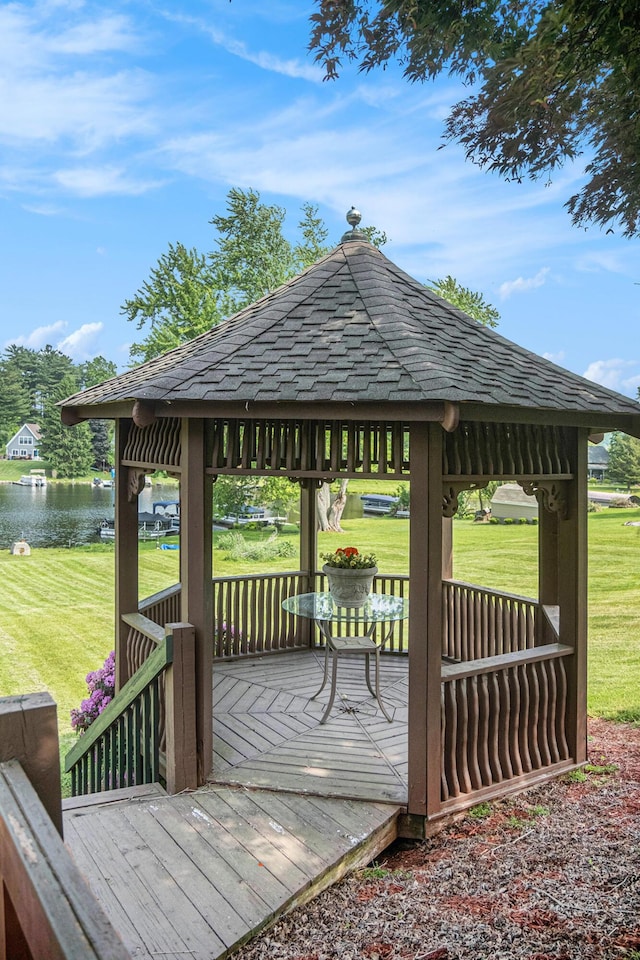 490 Skyline Dr, Horton, MI 49246 - deck featuring a gazebo, a water view, and a yard