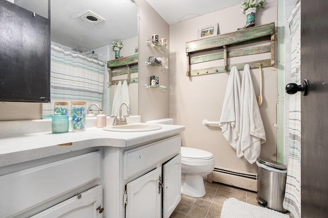 10172 US Highway 12, New Buffalo, MI 49117 - full bathroom with visible vents, a shower with shower curtain, toilet, vanity, and baseboard heating