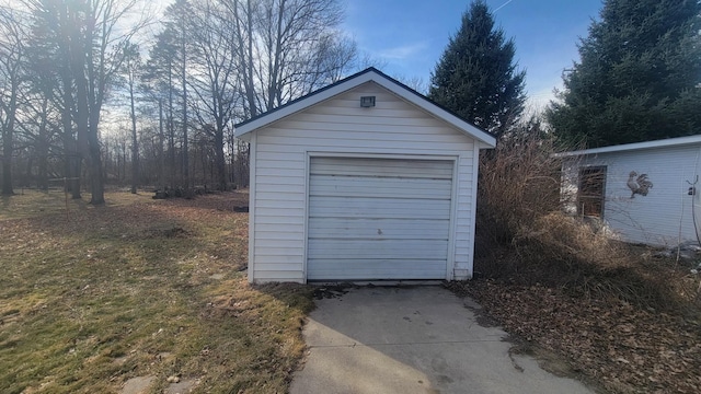 135 Handley St, Imlay City, MI 48444 - detached garage featuring a storage unit