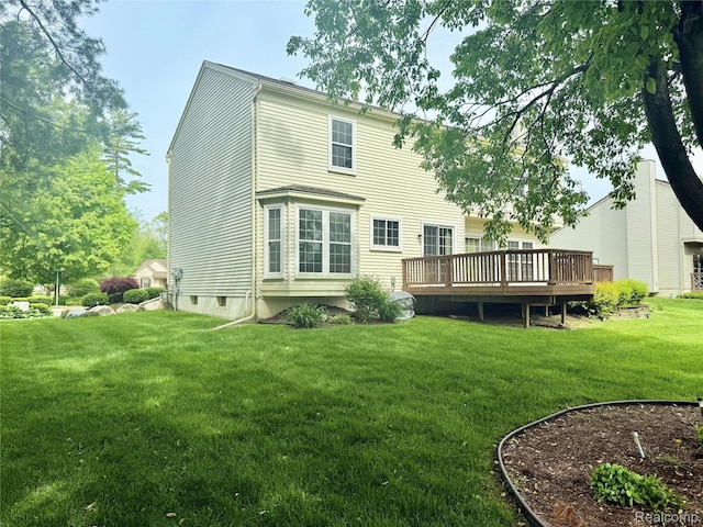 3023 Holben Dr, Lake Orion, MI 48360 - back of property with a yard and a deck