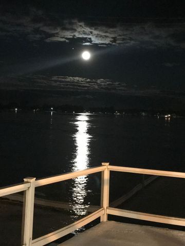 147 S Water St, Marine City, MI 48039 - view of dock featuring a water view and a balcony