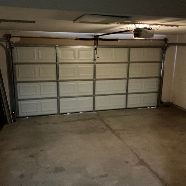 26766 Plumgrove Ln Unit 56, Farmington Hills, MI 48334 - garage with a garage door opener