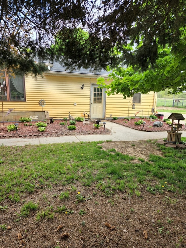 9448 Washburn Rd, Columbiaville, MI 48421 - rear view of house with fence