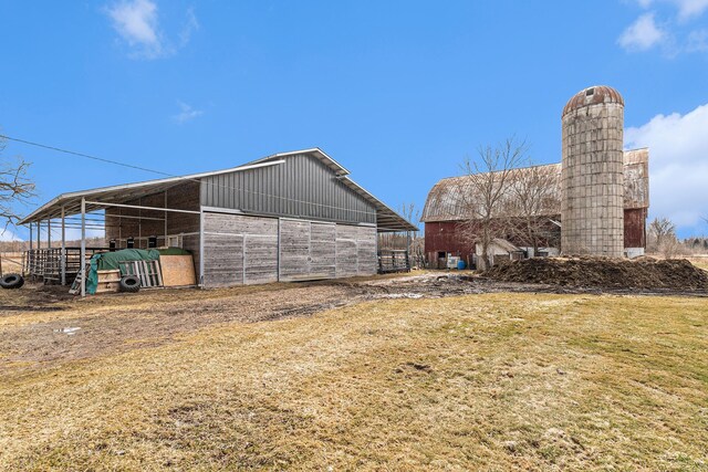 9448 Washburn Rd, Columbiaville, MI 48421 - view of barn with a lawn