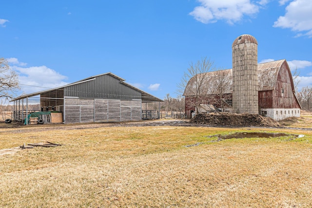9448 Washburn Rd, Columbiaville, MI 48421 - view of yard with an outdoor structure and a barn