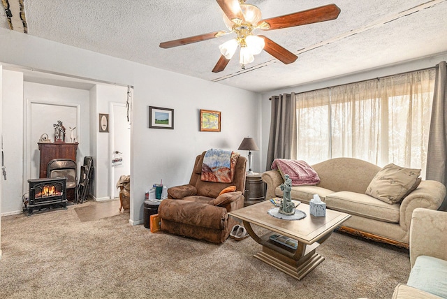 9448 Washburn Rd, Columbiaville, MI 48421 - carpeted living area featuring baseboards, a textured ceiling, and ceiling fan