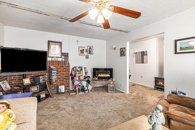 9448 Washburn Rd, Columbiaville, MI 48421 - living room featuring carpet flooring, a textured ceiling, ceiling fan, and a wood stove