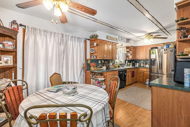 9448 Washburn Rd, Columbiaville, MI 48421 - dining room featuring ceiling fan and light wood-style flooring