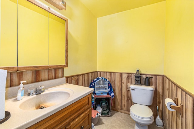9448 Washburn Rd, Columbiaville, MI 48421 - half bath featuring toilet, wainscoting, and vanity