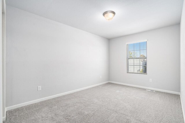 550 Needlewood Dr, Cedar Springs, MI 49319 - carpeted spare room with baseboards
