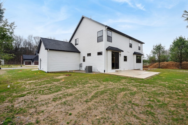 7865 Tessa Trl, Hudsonville, MI 49426 - rear view of property with a yard, central AC unit, and a patio area