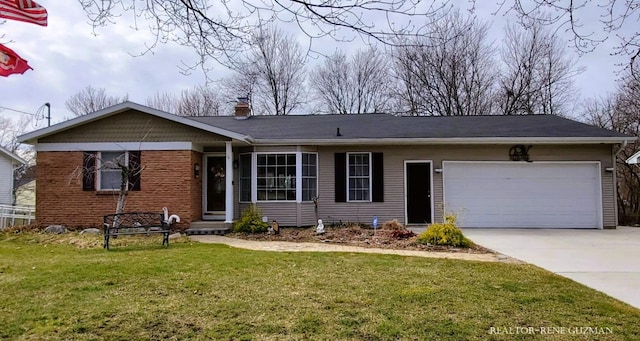 5393 Blaine Ave SE, Grand Rapids, MI 49508 - single story home featuring a garage, a chimney, concrete driveway, and a front lawn