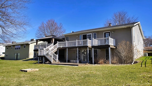 5393 Blaine Ave SE, Grand Rapids, MI 49508 - back of property featuring a patio, stairway, central AC unit, a wooden deck, and a yard