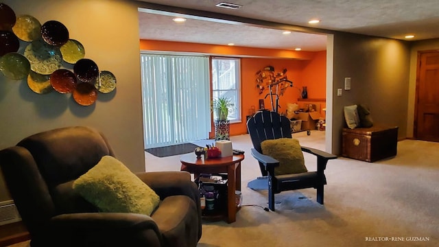 5393 Blaine Ave SE, Grand Rapids, MI 49508 - living area featuring recessed lighting, carpet, and visible vents