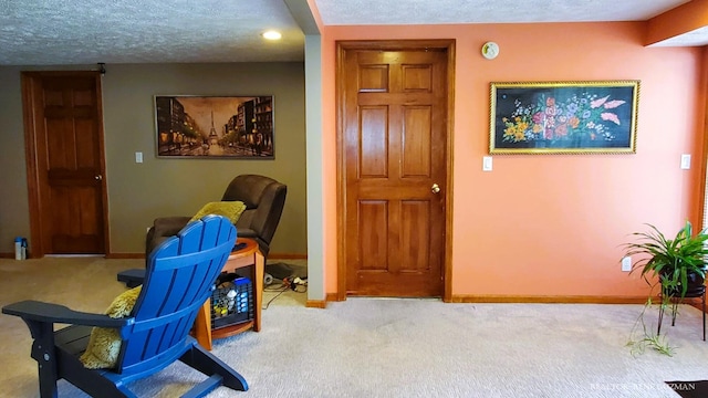 5393 Blaine Ave SE, Grand Rapids, MI 49508 - living area with baseboards, a textured ceiling, and carpet floors