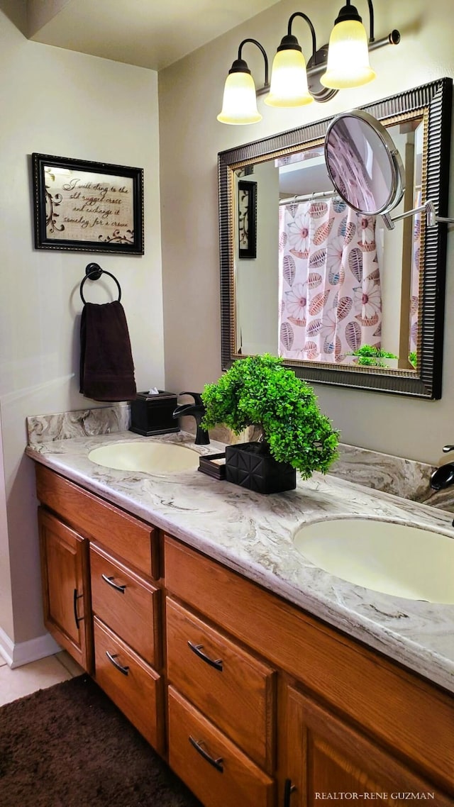 5393 Blaine Ave SE, Grand Rapids, MI 49508 - full bath with a sink and double vanity