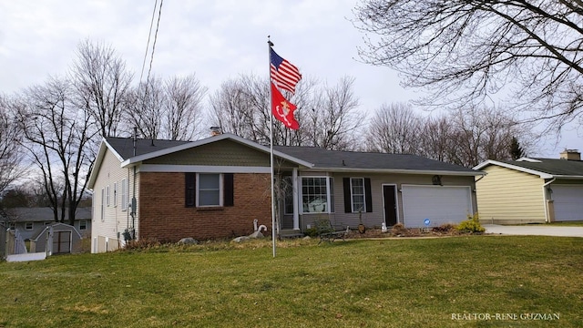 5393 Blaine Ave SE, Grand Rapids, MI 49508 - ranch-style home with brick siding, an attached garage, driveway, and a front lawn