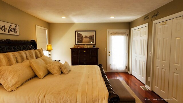 5393 Blaine Ave SE, Grand Rapids, MI 49508 - bedroom featuring recessed lighting, multiple closets, dark wood-style flooring, and baseboards