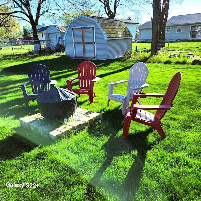 5393 Blaine Ave SE, Grand Rapids, MI 49508 - view of yard featuring a storage shed, an outdoor structure, and fence