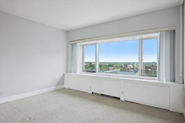 555 E William St, Ann Arbor, MI 48104 - empty room with light carpet and baseboards