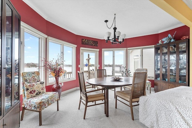 9283 Firwood Rd, South Lyon, MI 48178 - dining space featuring baseboards, a chandelier, crown molding, and light carpet