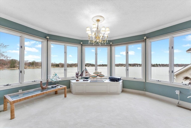 9283 Firwood Rd, South Lyon, MI 48178 - sunroom with a water view, visible vents, and a chandelier