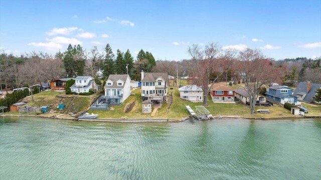 9283 Firwood Rd, South Lyon, MI 48178 - bird's eye view featuring a residential view and a water view