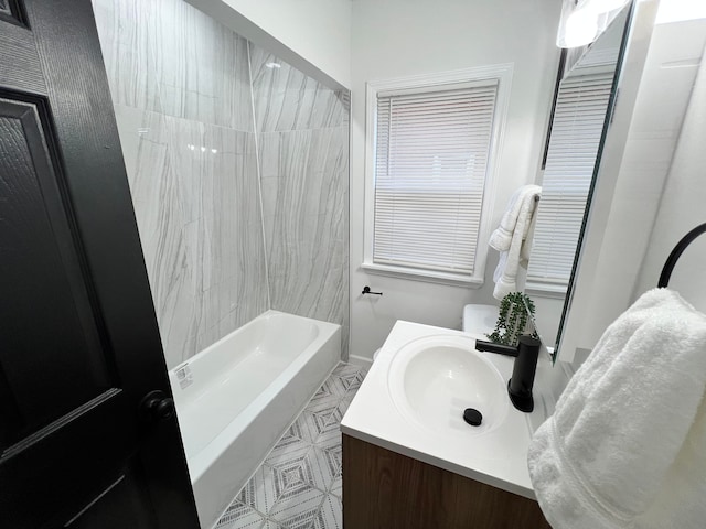 full bath with vanity and washtub / shower combination
