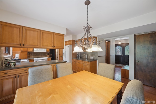 2915 Hillendale Dr, Rochester Hills, MI 48309 - dining space with wood finished floors and a chandelier