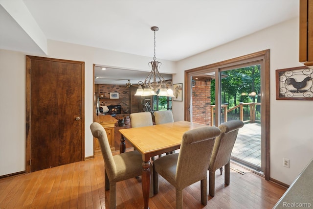 2915 Hillendale Dr, Rochester Hills, MI 48309 - dining space with light wood-style floors and a chandelier