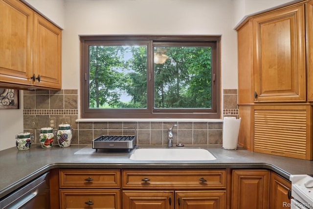 2915 Hillendale Dr, Rochester Hills, MI 48309 - kitchen with stainless steel dishwasher, decorative backsplash, healthy amount of natural light, and brown cabinets