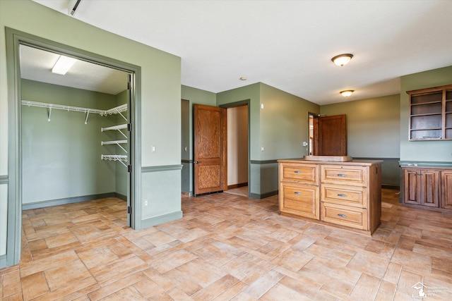 8650 Stone Rd, Maybee, MI 48159 - kitchen with open shelves and a center island