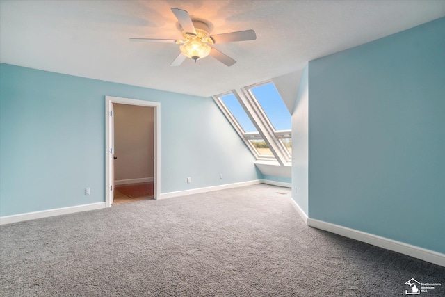 8650 Stone Rd, Maybee, MI 48159 - additional living space featuring ceiling fan, carpet flooring, and a skylight