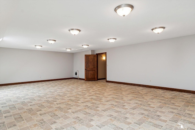 8650 Stone Rd, Maybee, MI 48159 - empty room featuring baseboards and heating unit