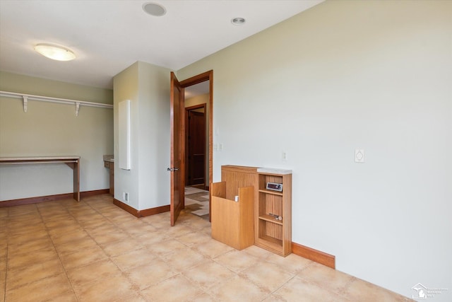 8650 Stone Rd, Maybee, MI 48159 - unfurnished bedroom featuring baseboards and a closet