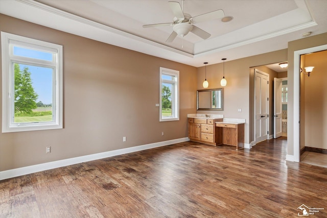 8650 Stone Rd, Maybee, MI 48159 - unfurnished living room with a raised ceiling, dark wood-style floors, and ceiling fan