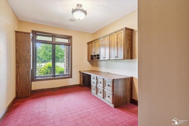 8650 Stone Rd, Maybee, MI 48159 - unfurnished office with built in study area and carpet flooring